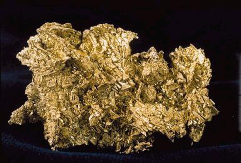 A naturally formed gold nugget shown as a native-gold reference